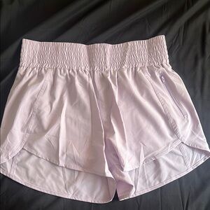 Purple Athletic Shorts with Elastic Waistband and Curved Hems